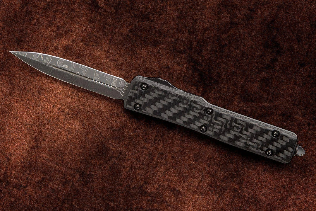 Coupon β¨ All Knife Brands Microtech UTX-70 D/E - Carbon Fiber - Damascus Blade 147-16CFS π 7 All Knife Brands Microtech UTX-70 D/E - Carbon Fiber - Damascus Blade 147-16CFS